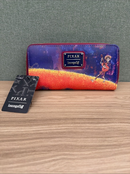Loungefly Handbags - Loungefly Pixar Coco Purple Orange Zip Wallet